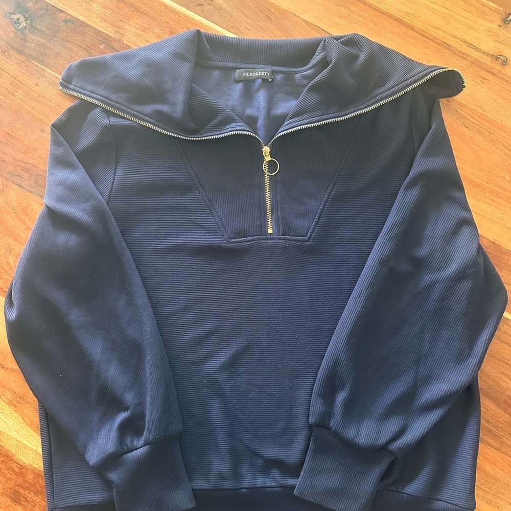 Blue Cowl Neck Sweater with Long Sleeves and gold zipper